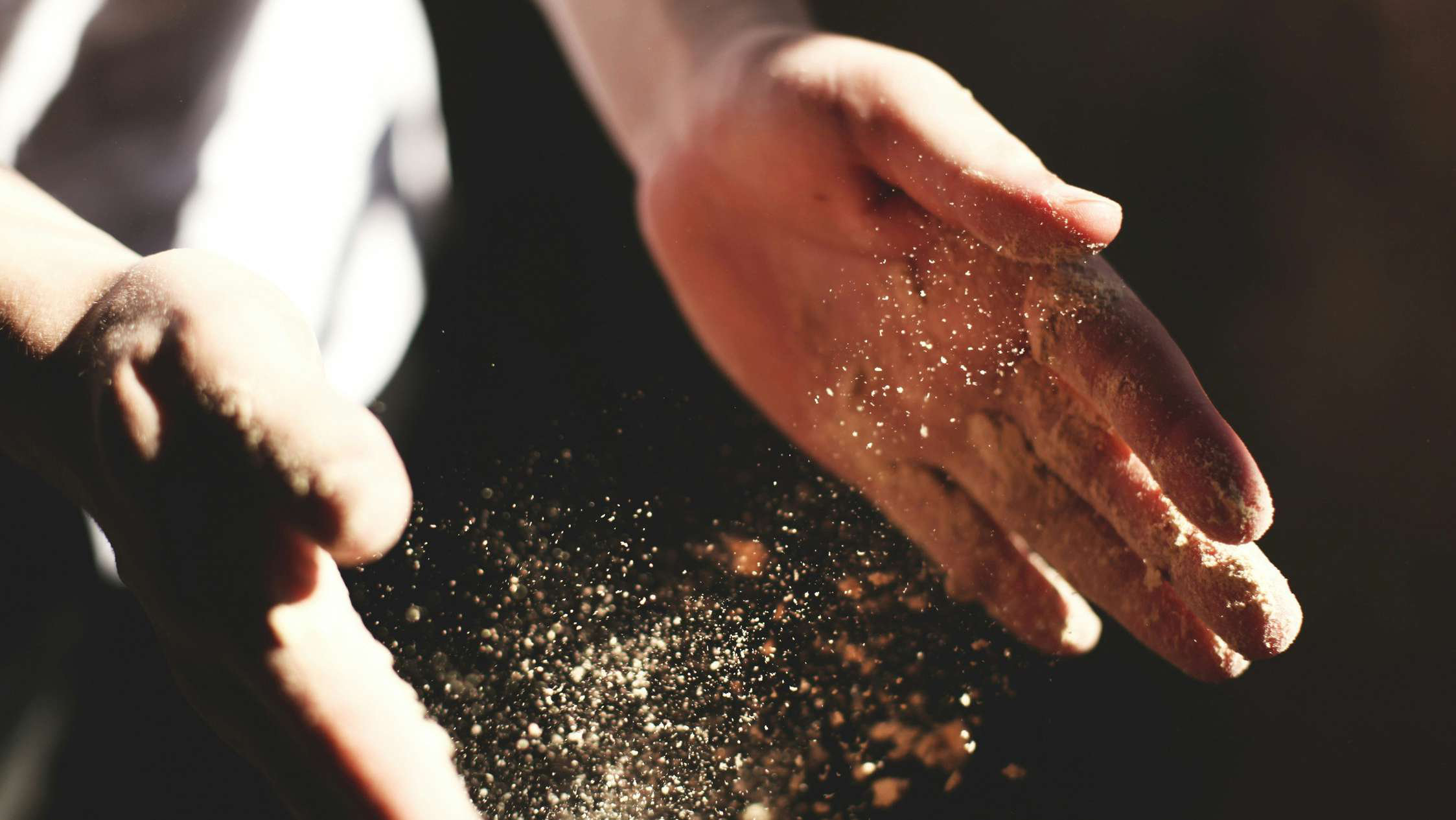 Hand holding green coffee