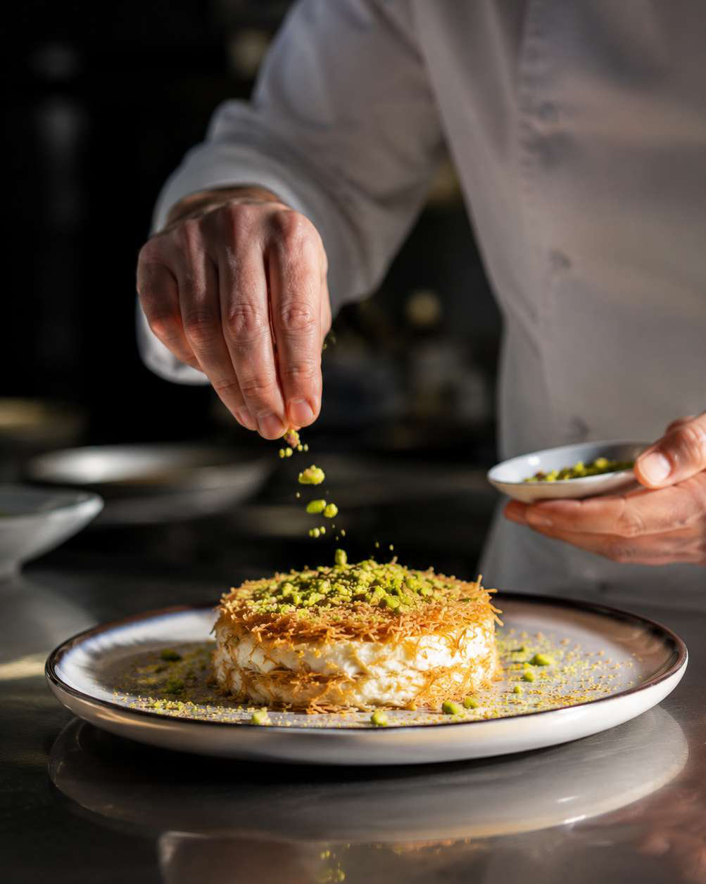 Chef plating a dish